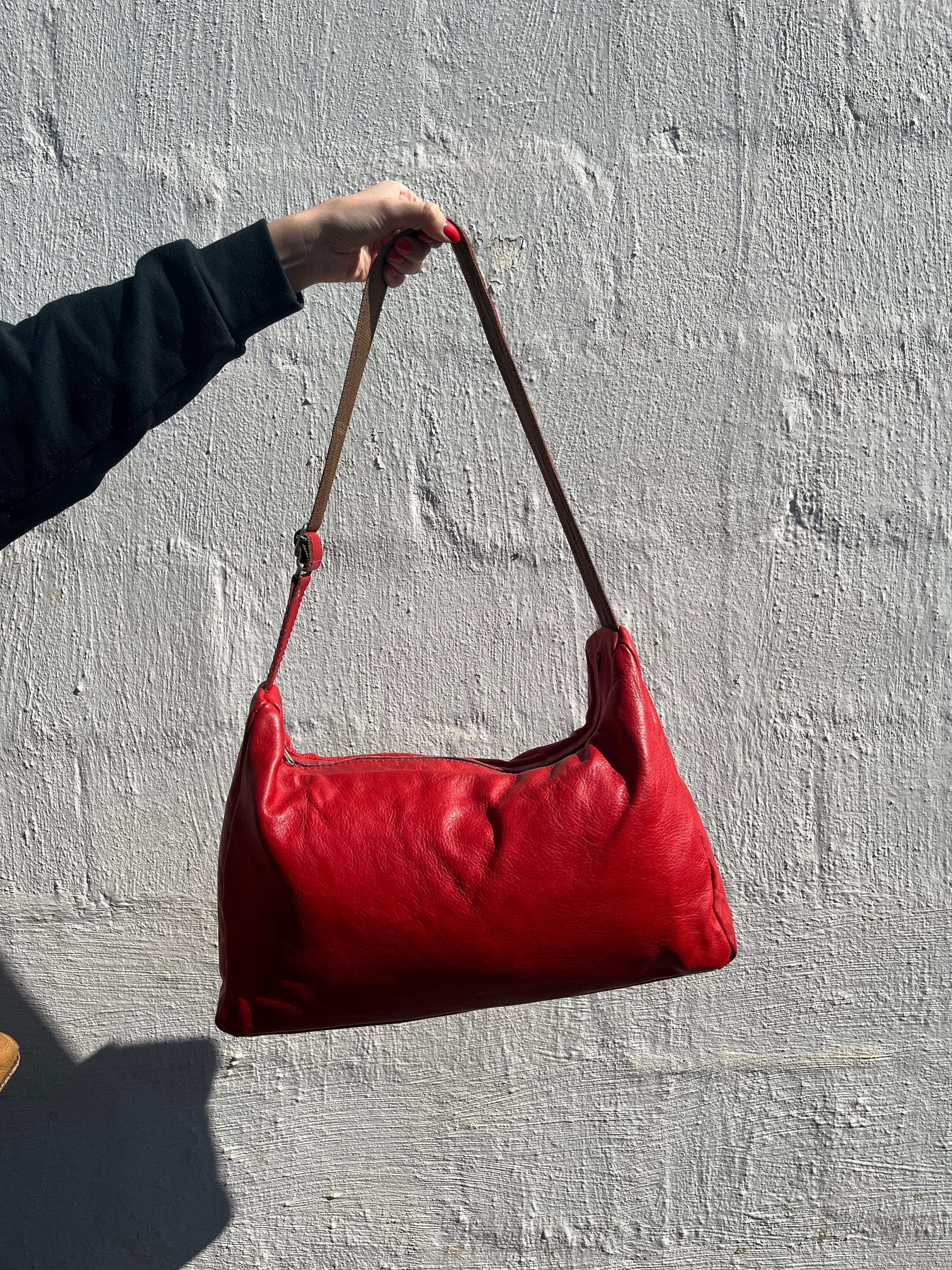 Close-up of hand-stitched leather handbag — made at Amber's in Howick