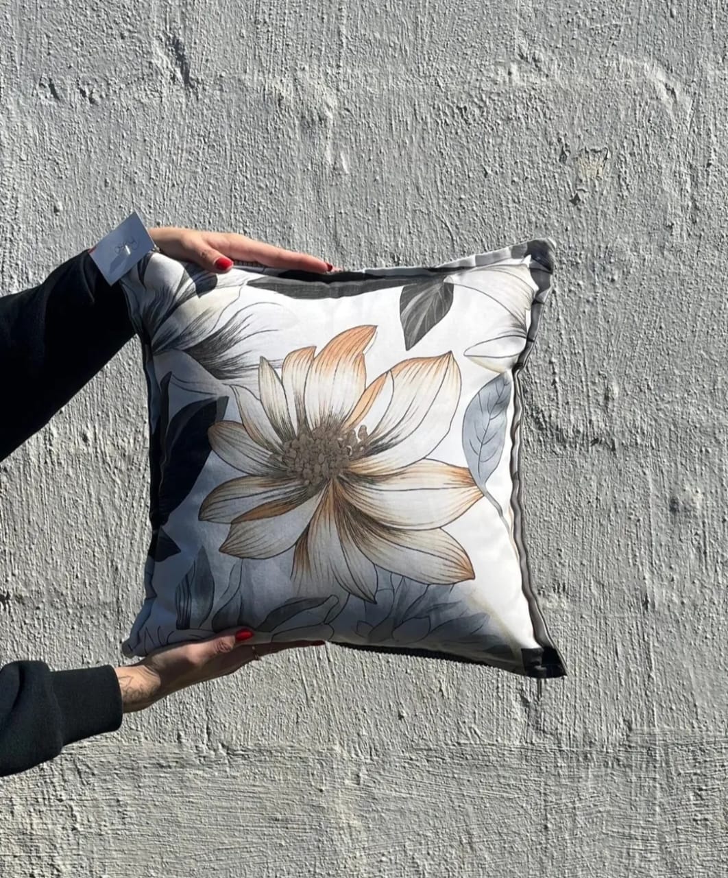 Textured cushion in neutral tones