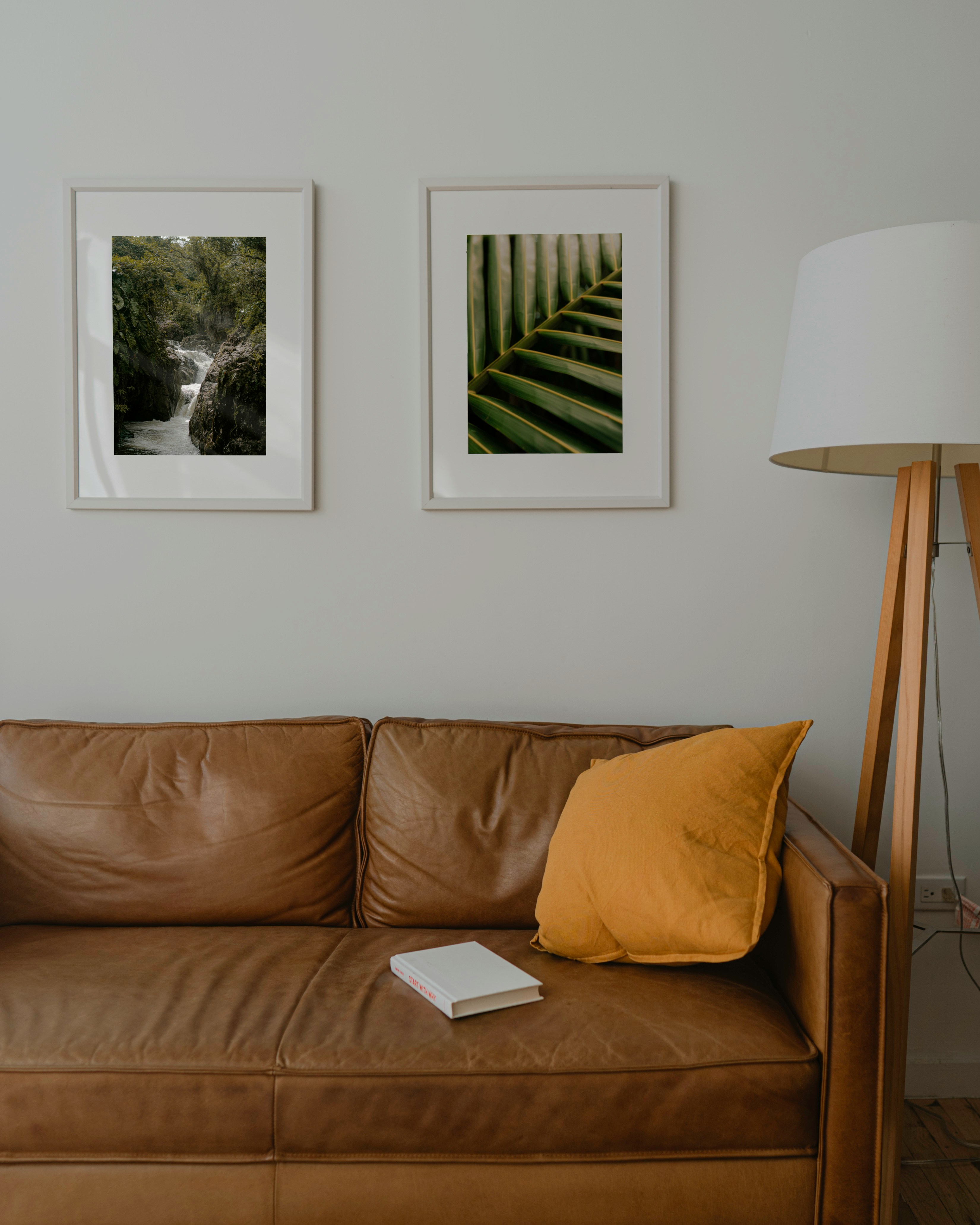 Premium tan leather sofa — the calibre Amber's produces for hospitality clients